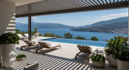Obraz premium Modern villa with infinity pool overlooking a stunning seascape under a bright blue sky