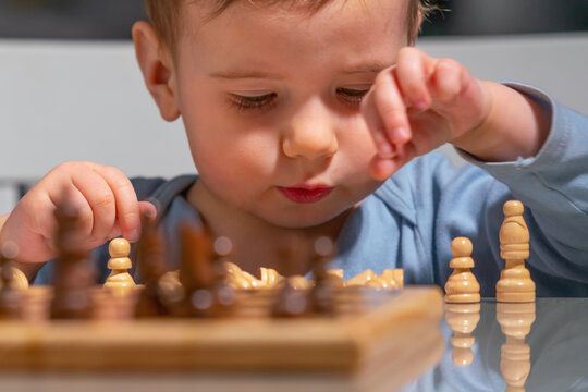Young grandmaster in training analyzing the battlefield.