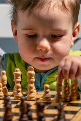 A future grandmaster learning that thinking is part of every great move.