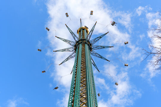 Vienna, Austria - February 24, 2026: Praterturm Starflyer Swing Ride Against Blue Sky in Vienna Austria