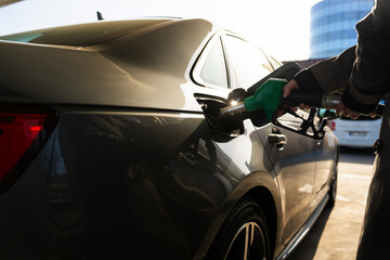 Close-up of fuel pump nozzle in car fuel tank © Rabizo Anatolii