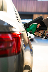 Gas station fuel pump refilling car with gasoline © Rabizo Anatolii