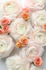 Obraz premium Beautiful ranunculuses and roses on white background, flat lay