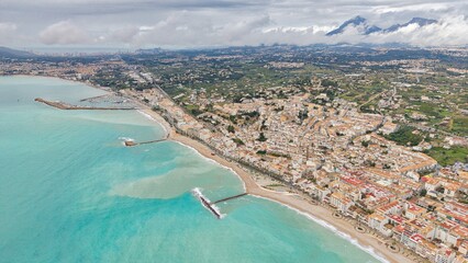Altea aerial view with old town, church, bay and cloudy mountains, Costa Blanca, Alicante, Spain
