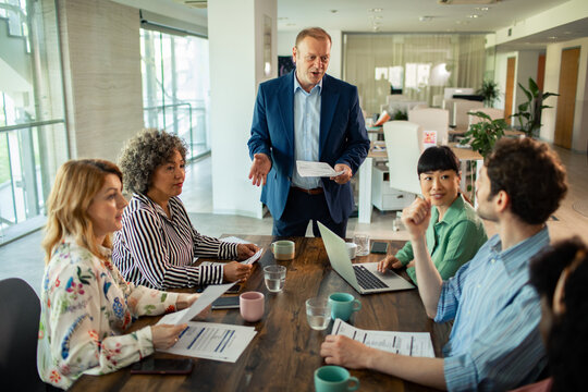 Diverse business team meeting in modern office