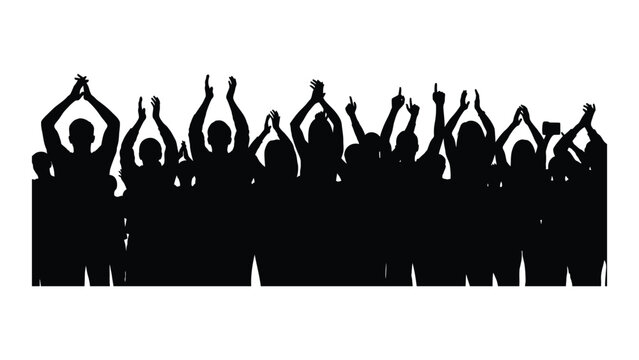 A group of people with their hands raised in the air