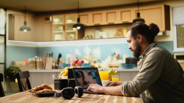 Professional photographer working remotely editing photos on laptop, content creation. Photo editing software with raw images and color grading adjustments highlighting creative post production.