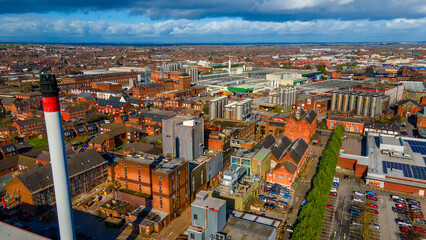 Obraz premium Aerial landscape of industrial brewery district and town horizon