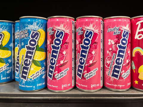 Refreshing Mentos Drink Cans in Vibrant Colors