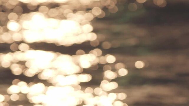 海と夕陽の玉ボケ