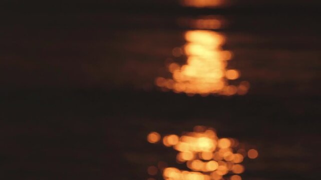 海と夕陽の玉ボケ