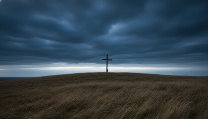 Obraz premium Cross, Easter, Calvary, Crucifixion, Christianity, Resurrection, Good Friday. Dramatic wooden cross on a grassy hill under dark stormy sky symbolizing religious sacrifice and hope.