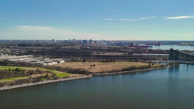 Aerial view of shipping containers and industrial port cranes on the Elizabeth River in Norfolk Virginia waterfront