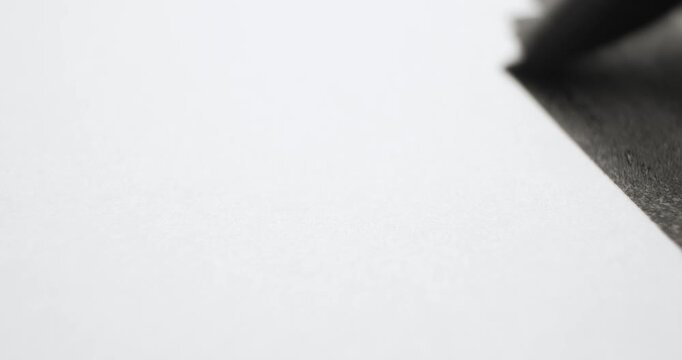 Covering the entire paper with black ink. Coloring a drawing with a black marker. Blacking out or censoring a document.