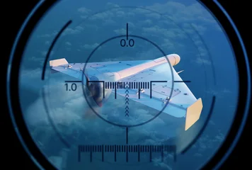 Military reconnaissance, Shahed loitering munition drone targeted in radar sight during flight, unmanned combat aircraft tracked in airspace, aerial surveillance and defense monitoring © Grispb