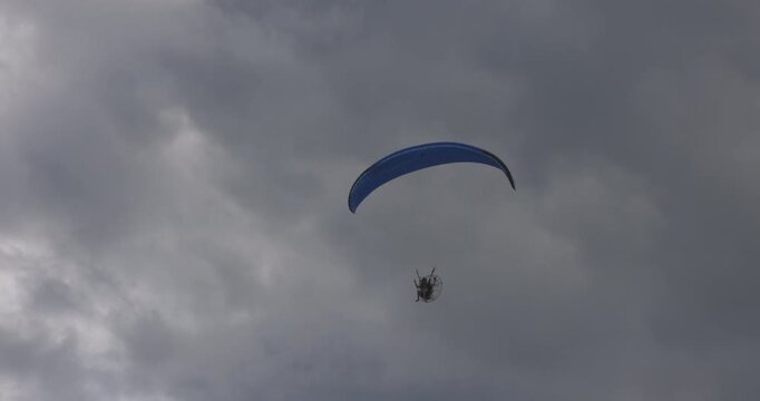Powered Paraglider on cloudy day