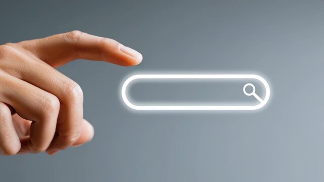 Hand touching a glowing web search bar on gray background  
