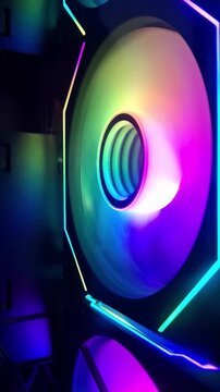 A side view of a computer cooling fan featuring deep blue and purple lighting on the blades and an integrated LED ring on the outer frame.
