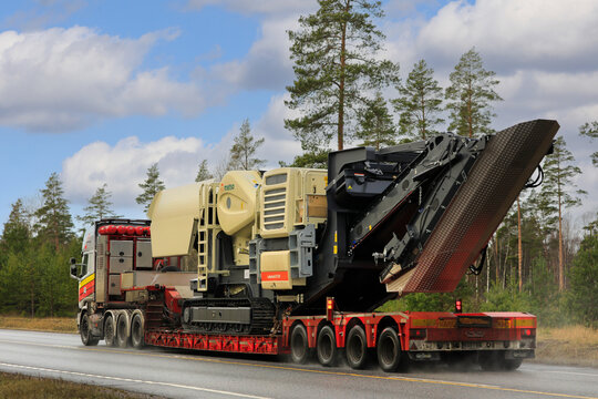 Oversize Load Transport of Metso Mobile Jaw Crusher on Road, Rear View. 
