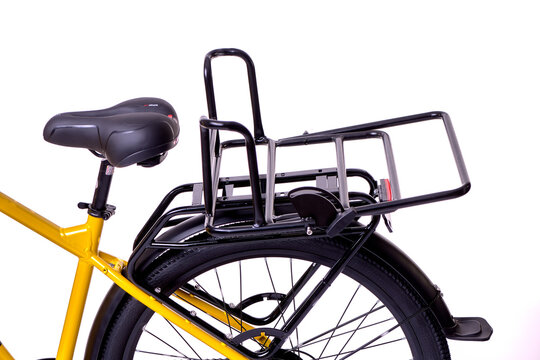 Yellow bike with rear cargo rack and black saddle