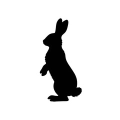Naklejka premium Cute black silhouette of a rabbit illustration with Easter and playful animal theme