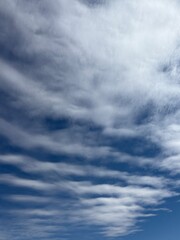 Fototapeta premium Dramatic White Cloud Texture Pattern Against Deep Blue Sky
