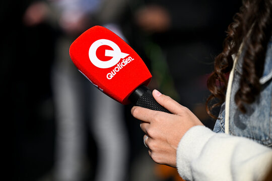 Illustration picture shows a microphone (mic, mike, micro) with the logo of the television show Quotidien on TMC in Paris, France on March, 8, 2026