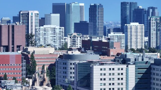 Cinematic Telephoto View of Century City Towers Over UCLA Campus
