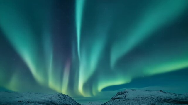 A captivating landscape depicts a vibrant display of the aurora borealis shimmering above snow-covered mountains, with an indigo sky