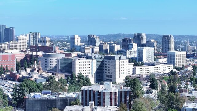 Telephoto Aerial Truck Over West LA High-Rise Corridor