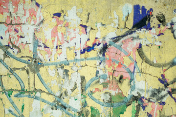 Naklejka premium A colorful abstract background. Old, cracked, peeling paint serves as the backdrop.