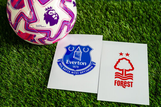 Everton vs. Nottingham Forest Premier League football game, official match ball on lush green pitch, wallpaper with copy space.