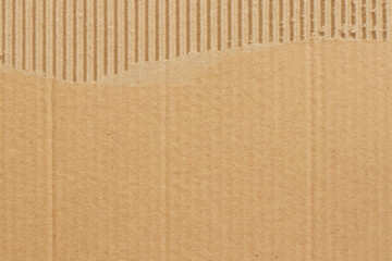 Brown cardboard sheet abstract background, texture of recycle paper box in old vintage pattern with ripped edges.