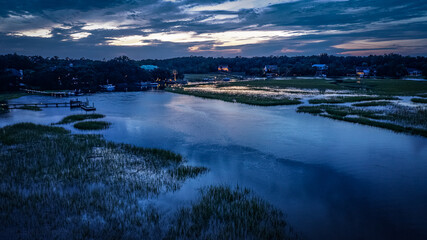 Fototapeta premium sunset over the river, south carolina, The Notebook, wedding, sunset, view, water, scenery, landscape, drone imaging, Charleston, filmed, famous movie, wedding hall
