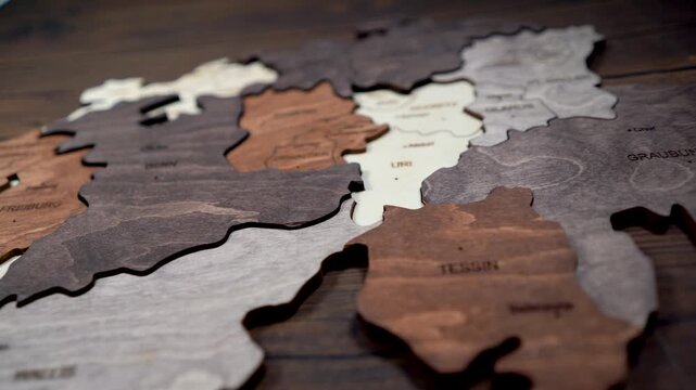 Wooden map of Switzerland world map made of wood as wall decoration. wall decorated with world map Switzerland wood puzzle.