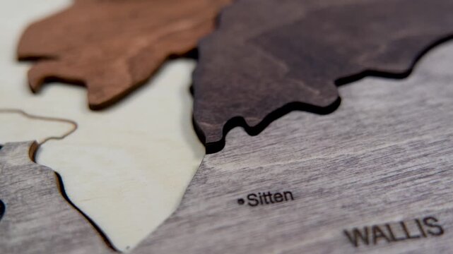 Wooden map of Switzerland world map made of wood as wall decoration. wall decorated with world map Switzerland wood puzzle.