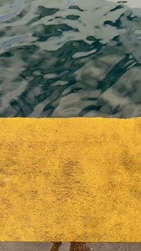 Vertical Harbor Borderline with Blue Sea Waves Minimal Coastal Scene Background