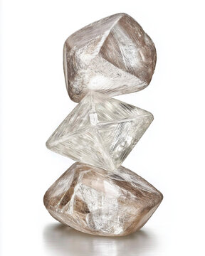 Balanced Stack of Rough Diamonds, Minimalist studio shot of three uncut diamonds stacked in equilibrium&mdash;textured, natural crystal forms on clean white background.