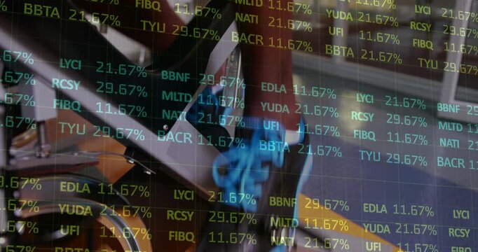 Male starting pedaling and moving foot while dim stock ticker over pedal updating rates for fitness