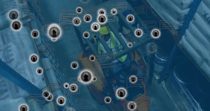 Warehouse worker operating orange pallet jack alerts spawning icons over controls receiving updates