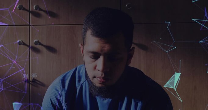 Man lowering gaze and rubbing face from fatigue, tech showing purple teal polygons around subject