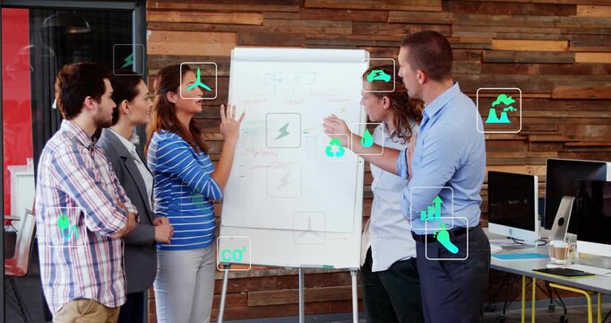 Vertical video: Diverse team meeting by chart in office, man pointing, planning with eco icons