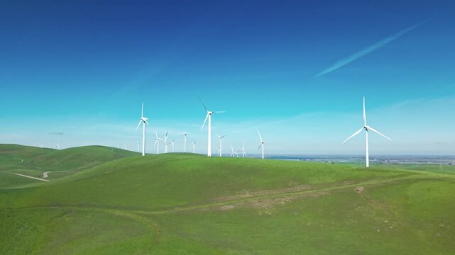 Overhead drone footage of wind turbines at Altamont Pass Wind Farm, Dublin, California. Fits clean energy, climate change, environmental, and technology media use