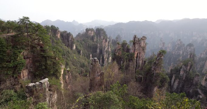 Majestic view of unique quartz sandstone pillars of Wulingyuan, famous World Heritage Site in Hunan province of China. Scenic landscape panorama from Tianzi Mountain observation deck