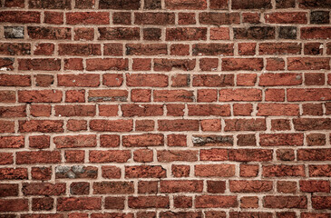 Obraz premium Red bricks masonry wall texture. Vintage bricks brick wall background pattern. Rustic bricks wall surface structure. Classic bricks mortar wall.