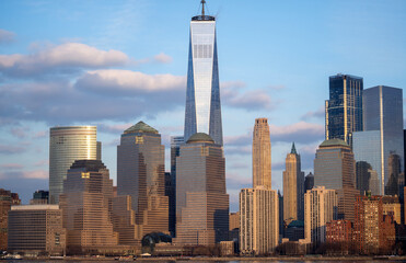 Naklejka premium Manhattan waterfront panorama with modern skyscrapers in New York City, NYC. New York skyline panorama. Manhattan skyline daytime panorama in New York City. New York City skyline.