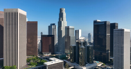 Fototapeta premium Los Angeles downtown skyline financial district. Los Angeles urban skyline modern architecture. Los Angeles cityscape towers skyscrapers panorama. Los Angeles aerial skyline sunny day.