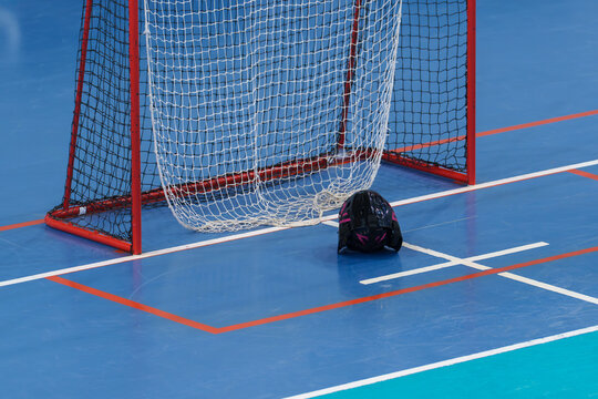 floorball goal and goalkeeper helmet