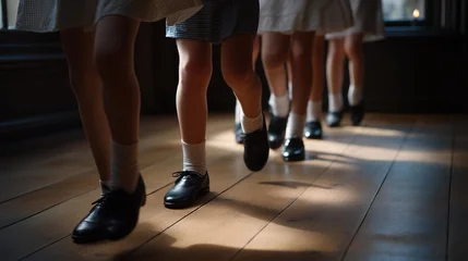 Fototapete Tanzschule Irish dance school students practicing hard shoes wooden floor St Patricks Day performance rehearsal cultural heritage young dancers preserving tradition choreography, ideal for Irish culture St  © forenna