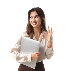 Naklejka premium Beautiful young businesswoman with laptop showing OK on white background